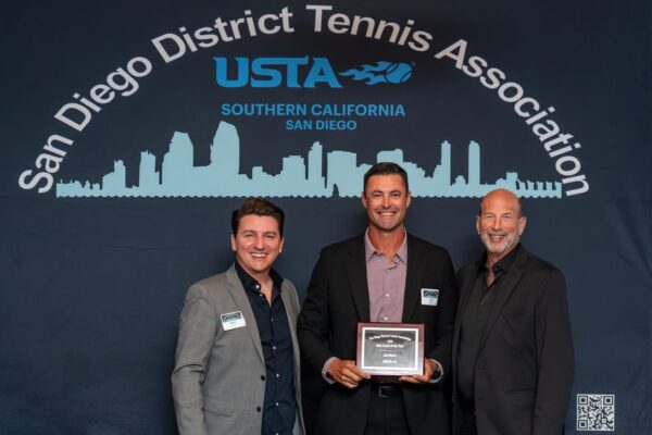 Joel Myers receiving the 2026 USTA San Diego District Male Coach of the Year award